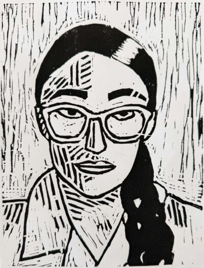 Student artwork of a lino print portrait