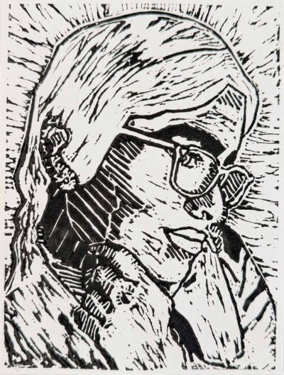Student artwork of a lino print portrait