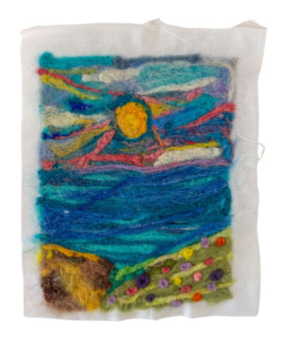 Student artwork of a needle felt of a scenery with sun