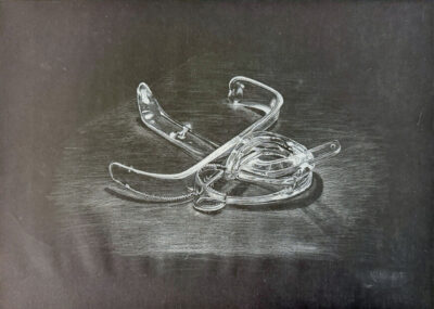 Student artwork of a tonal drawing of twisted cutlery